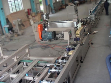 Plastic coated metal pipe extrusion line